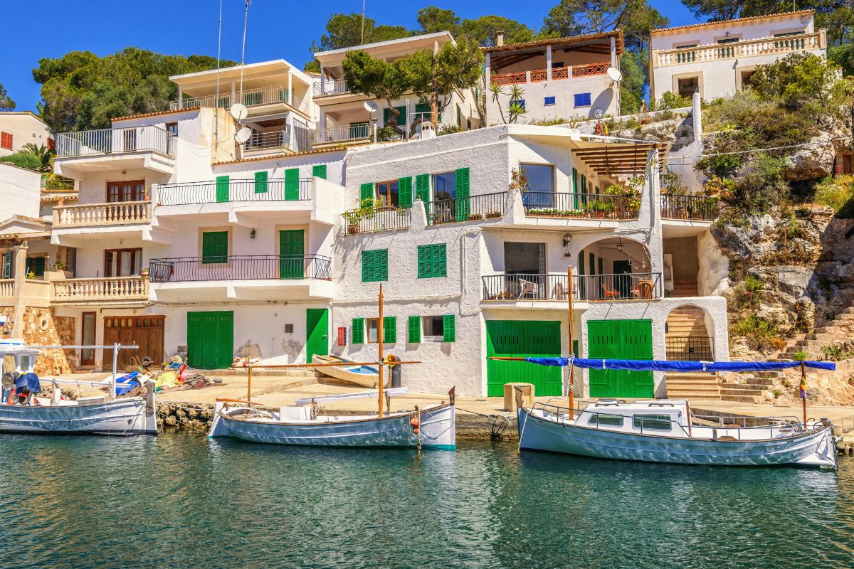 Image depicting typical spanish boats in an Mallorcan village